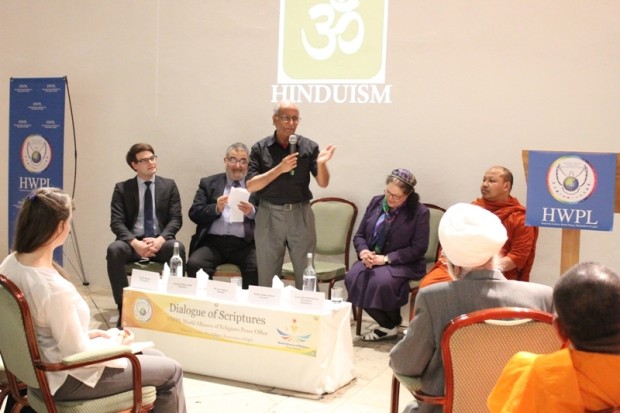 2 A Representative of Hinduism is Deliveringaspeech at WARP Office Meeting in the UK